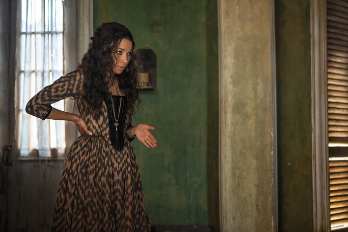 Jessica Parker Kennedy in a patterned dress