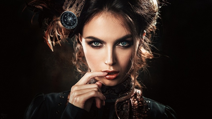Woman with compass hat and makeup