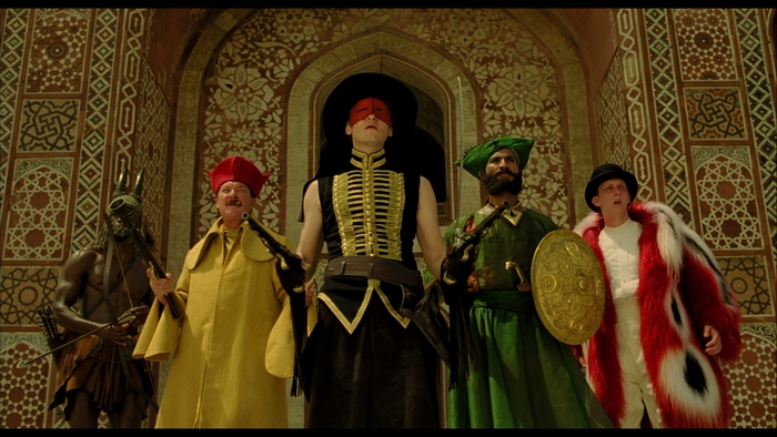 Lee Pace and companions in elaborate costumes