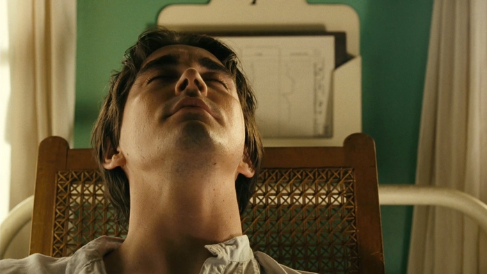 Lee Pace in a chair