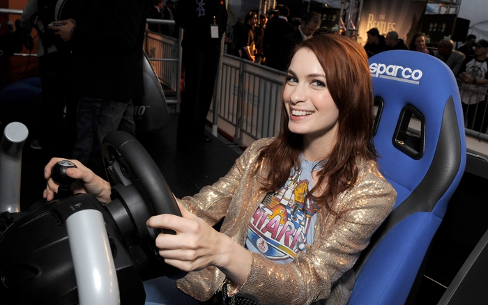 Felicia Day in a racing simulator
