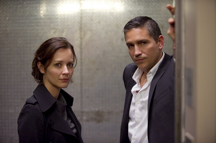 Jim Caviezel in a dark suit