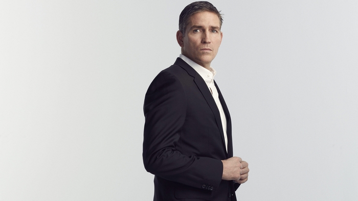 Jim Caviezel in a black suit