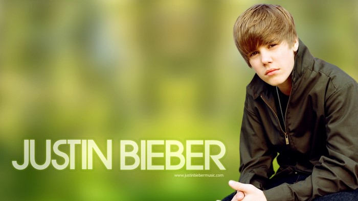 Justin Bieber sitting outdoors