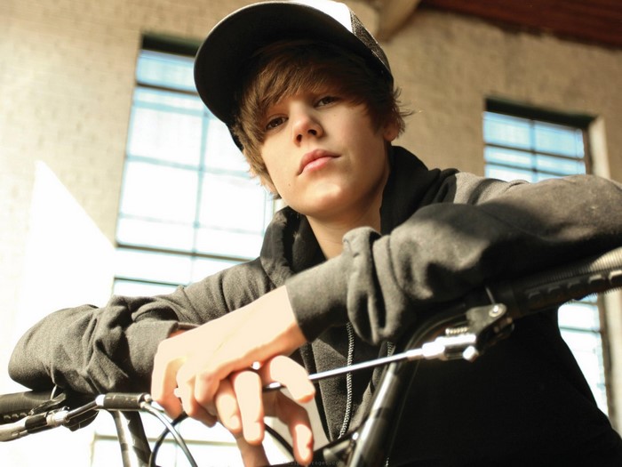 Justin Bieber on a bicycle