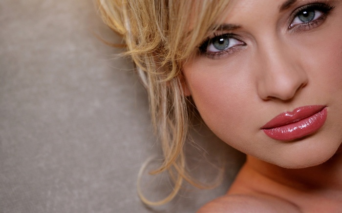Close-up of a woman's face with blonde hair
