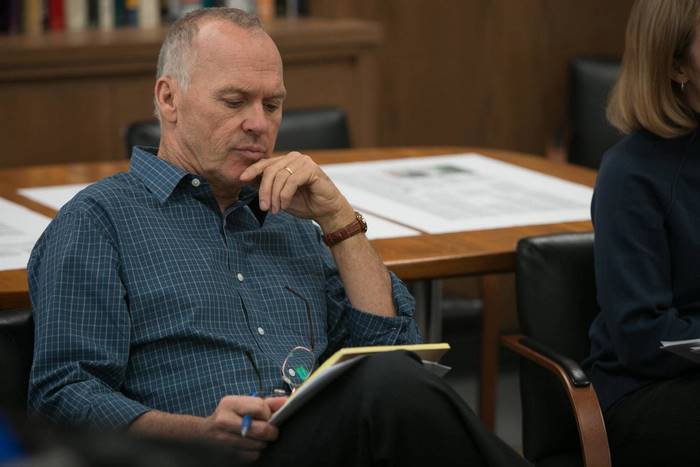 Michael Keaton in a meeting