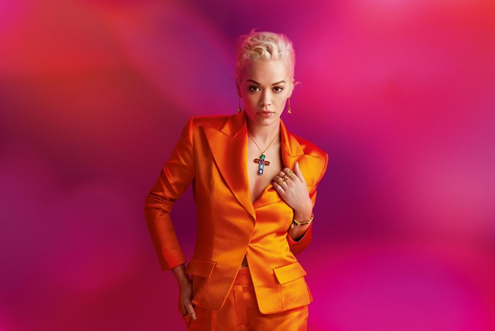 Rita Ora in an orange suit