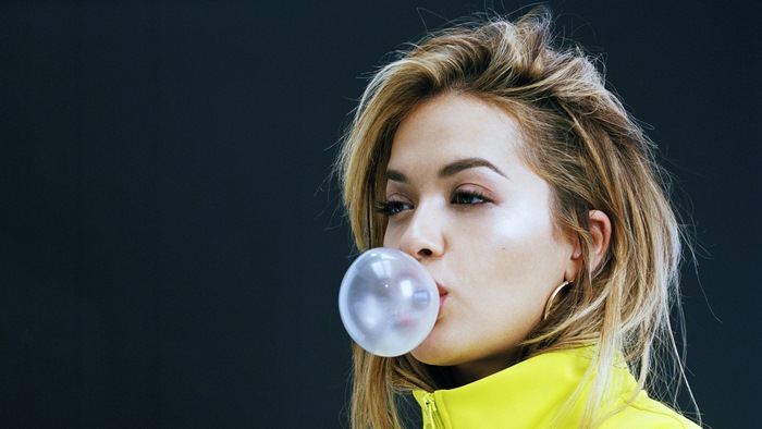 Rita Ora blowing bubble gum