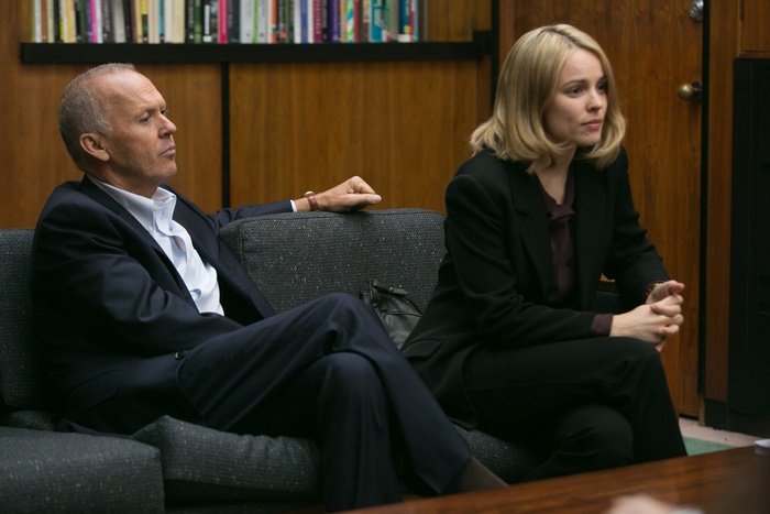 Michael Keaton and Rachel McAdams in a meeting