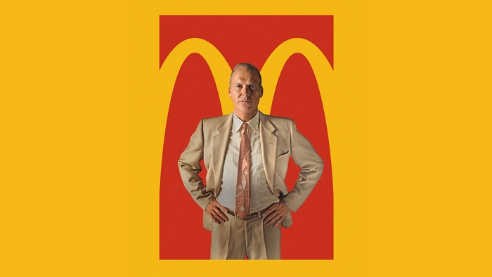 Michael Keaton in front of McDonald's logo