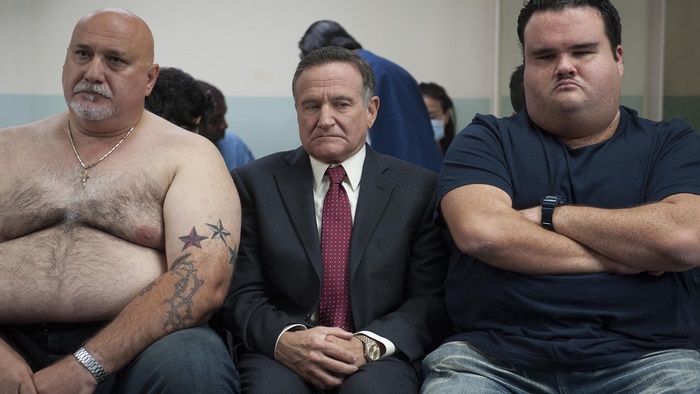 Robin Williams and two men sitting