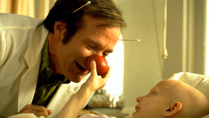 Patch Adams with a child patient