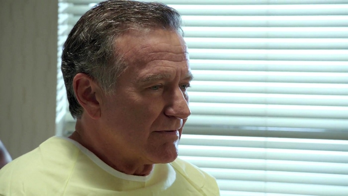 Robin Williams in a hospital gown