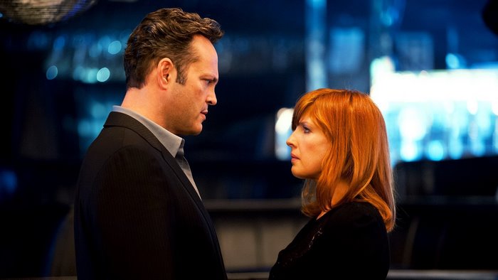 Vince Vaughn and woman in dark setting