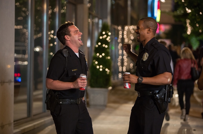 Damon Wayans Jr. and another man as police officers