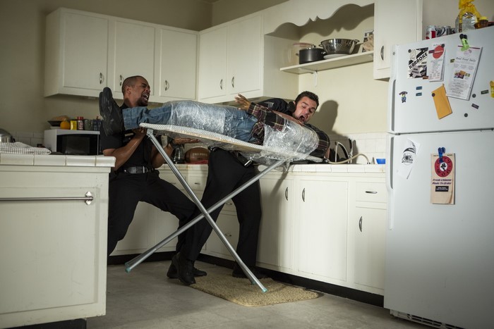 Damon Wayans Jr. in a kitchen