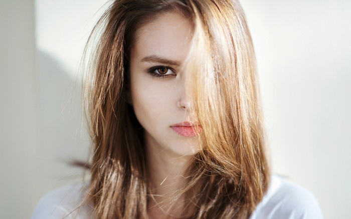 Woman with hair covering half her face