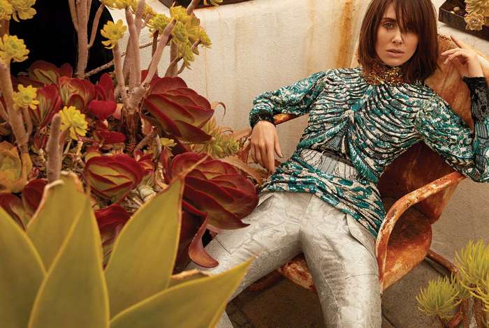 Alison Brie in a patterned top and silver pants