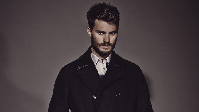 Jamie Dornan in a black coat