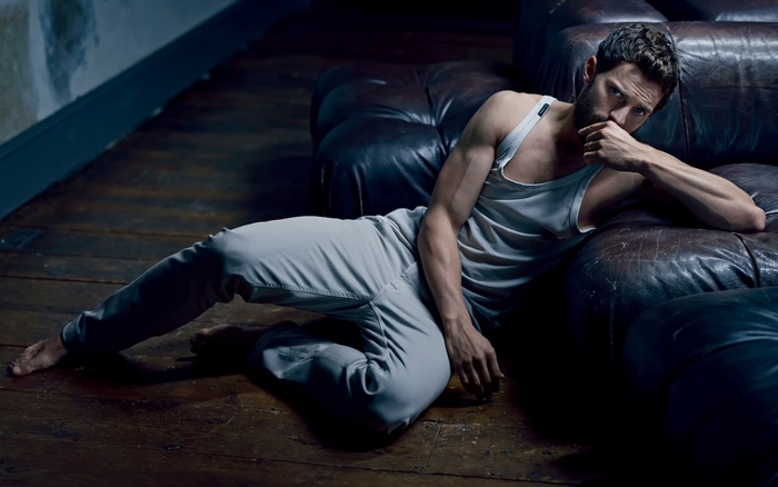 Jamie Dornan in a tank top and sweatpants
