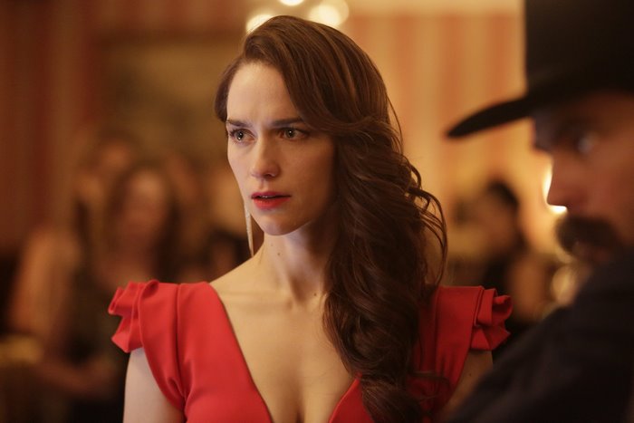 Melanie Scrofano in a red dress