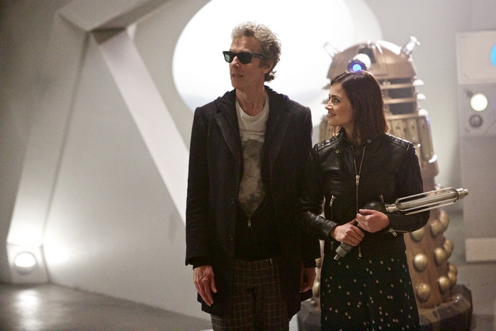 Peter Capaldi and Clara Oswald with a Dalek