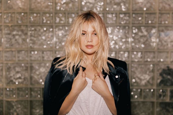 Olivia Holt in black jacket