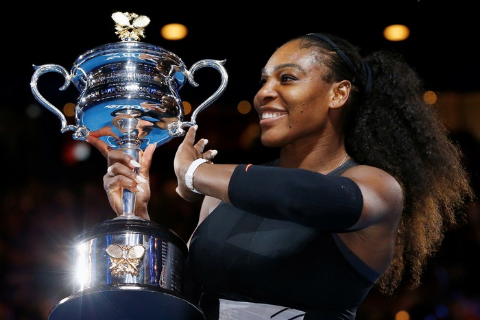 Serena Williams holding a trophy