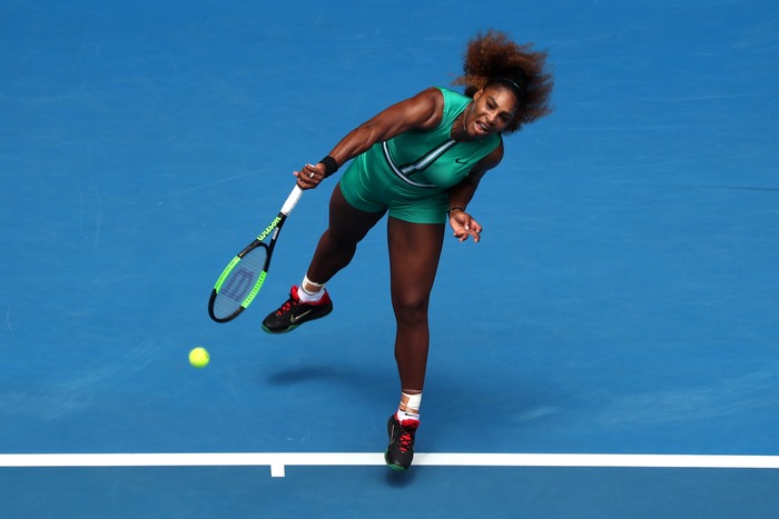 Serena Williams serving a tennis ball