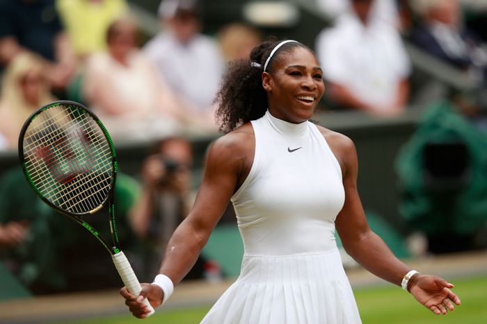 Serena Williams playing tennis at Wimbledon