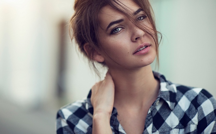 Woman in a plaid shirt