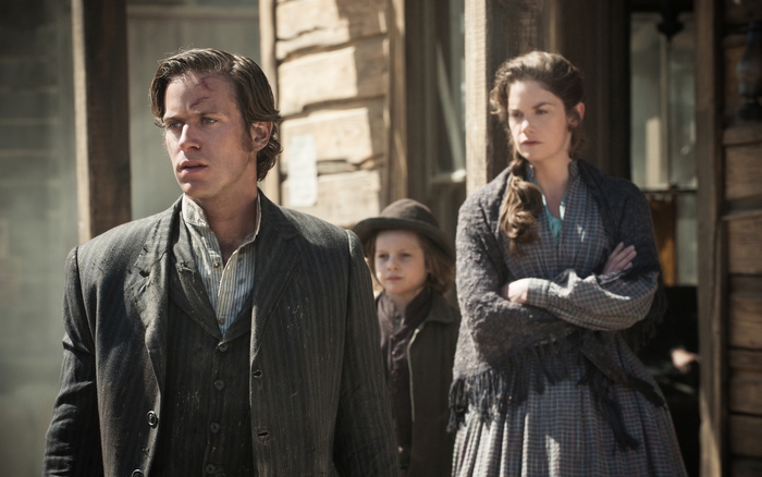 Armie Hammer and two children in western attire