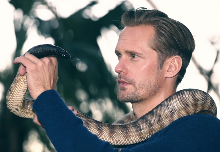 Alexander Skarsgård with a snake