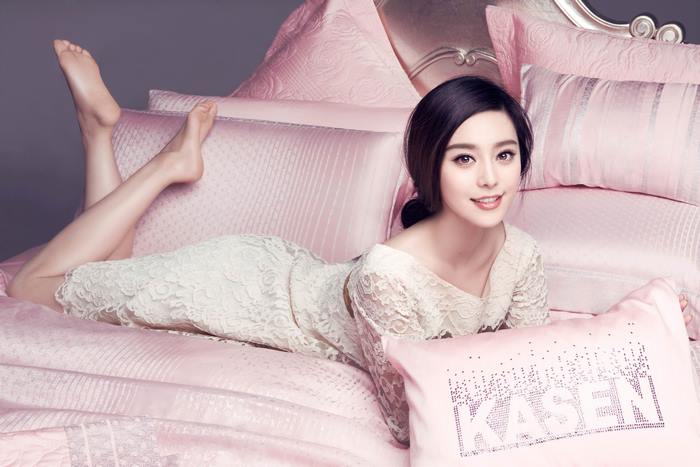 Fan Bingbing on a pink bed