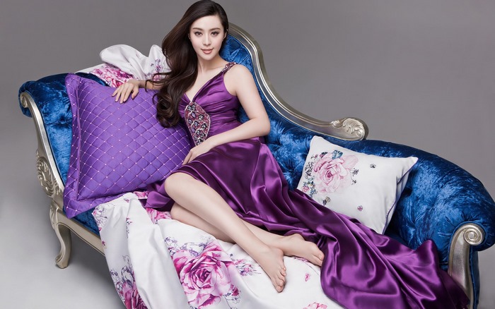 Fan Bingbing in Purple Satin Dress on Blue Couch