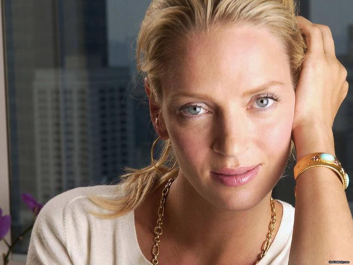Close-up Portrait of Uma Thurman with Golden Bracelet