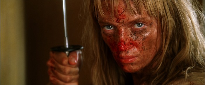 Uma Thurman holding a sword