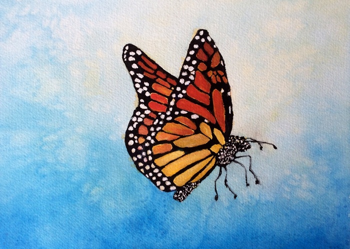 Monarch butterfly on a blue background