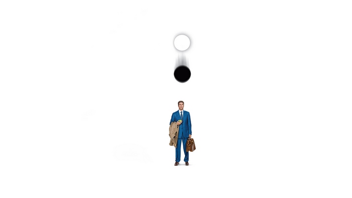 Will Ferrell in a blue suit with a briefcase