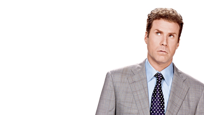 Will Ferrell in a suit looking up
