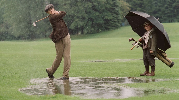 Shia LaBeouf playing golf in the rain