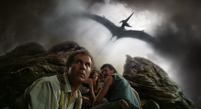 Will Ferrell and companions in a prehistoric landscape