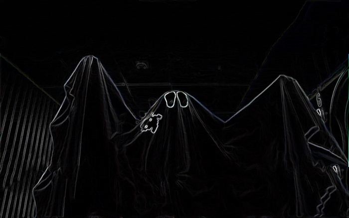 Two ghosts covered by a sheet