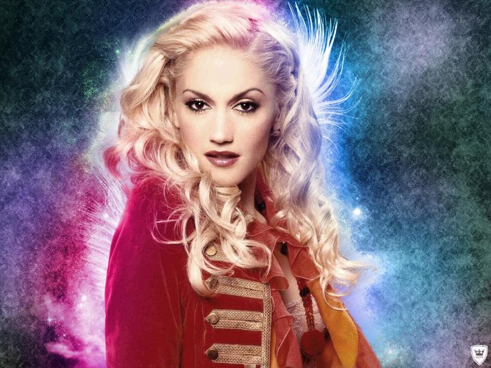 Gwen Stefani in red jacket with colorful background