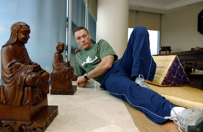 Jean-Claude Van Damme posing indoors