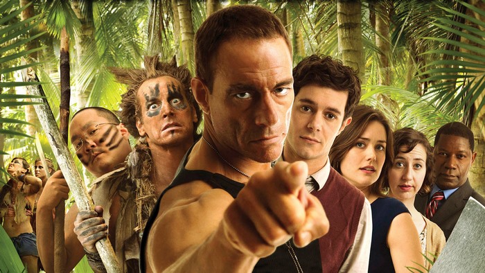 Jean-Claude Van Damme and cast in jungle setting