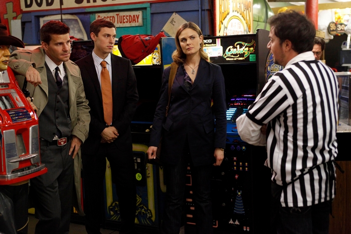 John Francis Daley and colleagues in an arcade