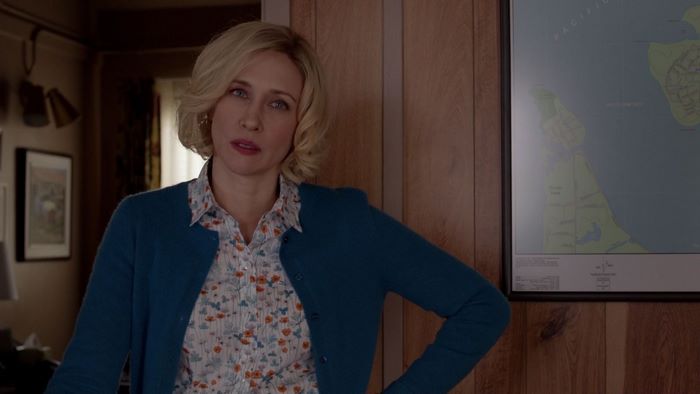 Vera Farmiga in a blue cardigan
