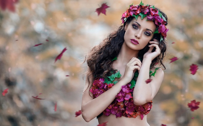 Woman with flower crown and floral top